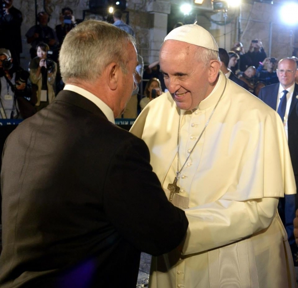 Mr. Wajeeh Nuseibeh, the Custodian for the Key to the Church of the Holy Sepulcher greets Pope Francis in Jerusalem during his latest visit to the Holy Land in May 2014